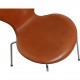 Set of four Arne Jacobsen Seven chairs in patinated cognac leather