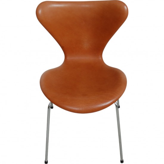 Set of four Arne Jacobsen Seven chairs in patinated cognac leather