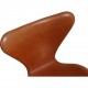 Set of four Arne Jacobsen Seven chairs in patinated cognac leather