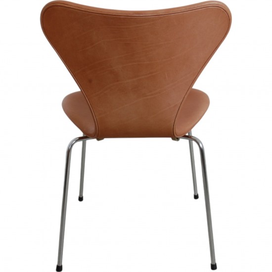 Set of four Arne Jacobsen Seven chairs in patinated cognac leather