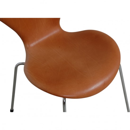 Set of four Arne Jacobsen Seven chairs in patinated cognac leather