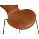 Set of four Arne Jacobsen Seven chairs in patinated cognac leather