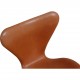 Set of four Arne Jacobsen Seven chairs in patinated cognac leather