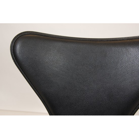 Arne Jacobsen barstool front upholstered in black leather