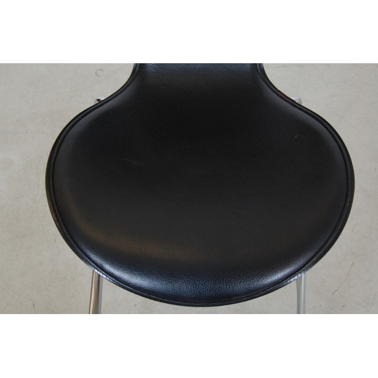 Arne Jacobsen barstool front upholstered in black leather