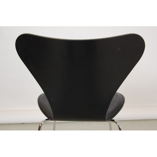 Arne Jacobsen barstool front upholstered in black leather