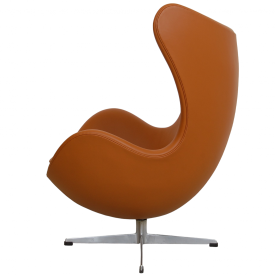  Arne Jacobsen Egg chair Reupholstered in whisky-colored Nevada aniline leather with repair