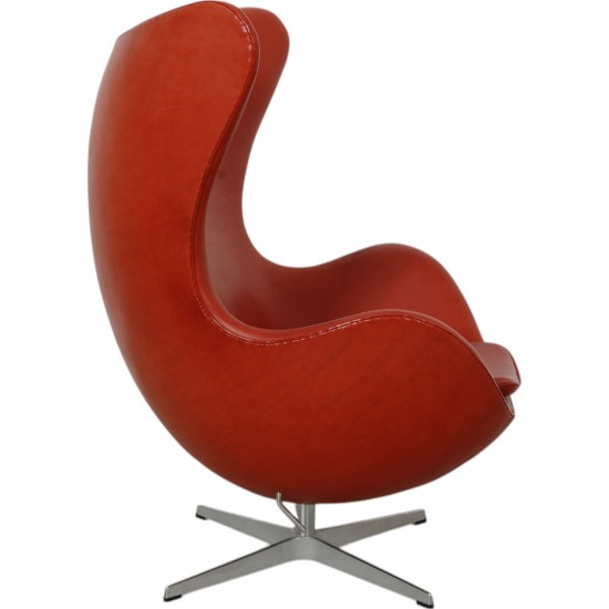 Arne Jacobsen Egg chair with stool in indian red anilin leather