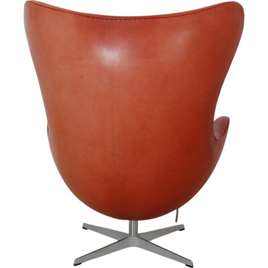 Arne Jacobsen Egg chair with stool in indian red anilin leather