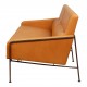 Arne Jacobsen 2-seater Airport sofa with cognac aniline leather and brass frame.