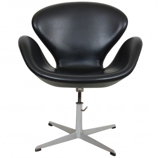 Arne Jacobsen height adjustable Swan chair in black classic leather