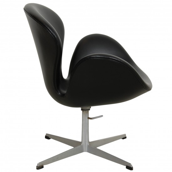 Arne Jacobsen height adjustable Swan chair in black classic leather