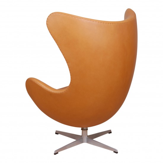 Arne Jacobsen ægget med ældre fod nypolstret i cognac anilin læder