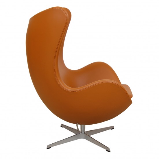 Arne Jacob Egg chair reupholstered in whisky Nevada aniline leather