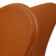 Arne Jacob Egg chair reupholstered in whisky Nevada aniline leather