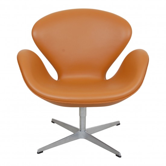 Arne Jacobsen Swan newly upholstered in cognac Nevada aniline leather