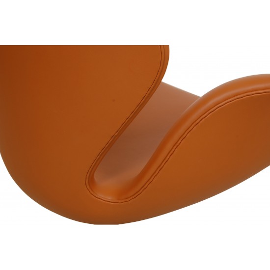 Arne Jacobsen Swan newly upholstered in cognac Nevada aniline leather