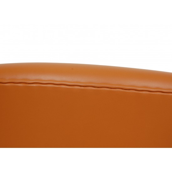 Arne Jacobsen Swan newly upholstered in cognac Nevada aniline leather