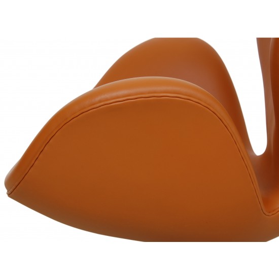 Arne Jacobsen Swan newly upholstered in cognac Nevada aniline leather