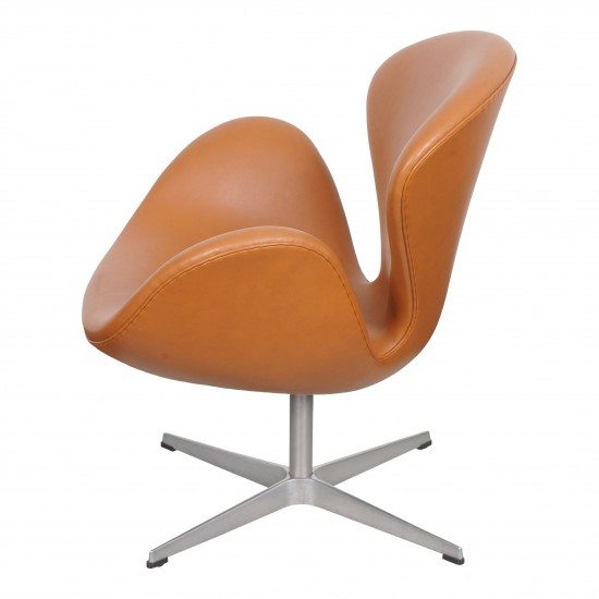 Arne Jacobsen Swan newly upholstered with cognac classic leather