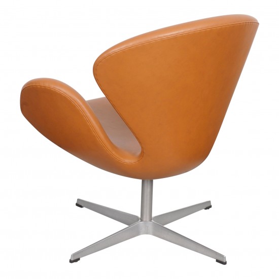 Arne Jacobsen Swan newly upholstered with cognac classic leather