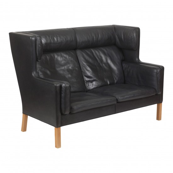 Børge Mogensen 2 pers Coupé sofa with original patinated black leather and oak wood legs