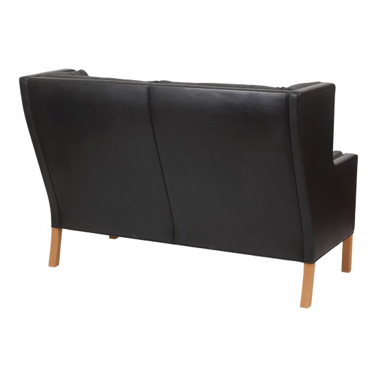 Børge Mogensen 2 pers Coupé sofa with original patinated black leather and oak wood legs