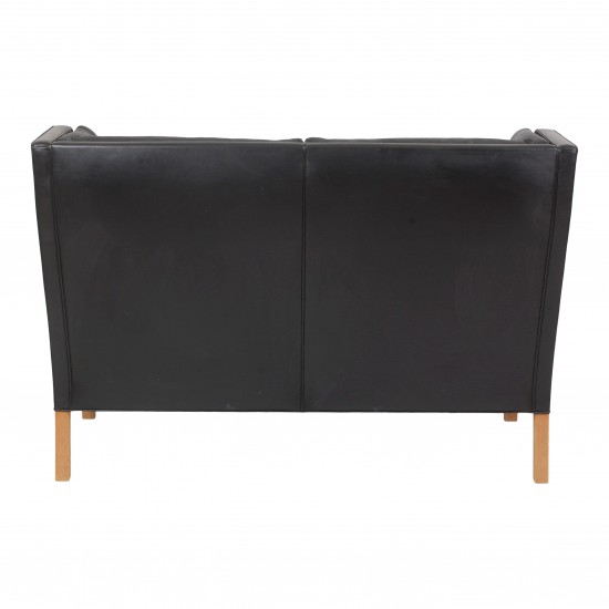 Børge Mogensen 2 pers Coupé sofa with original patinated black leather and oak wood legs