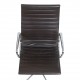 Charles Eames Ea-119 office chair with patinated dark brown leather