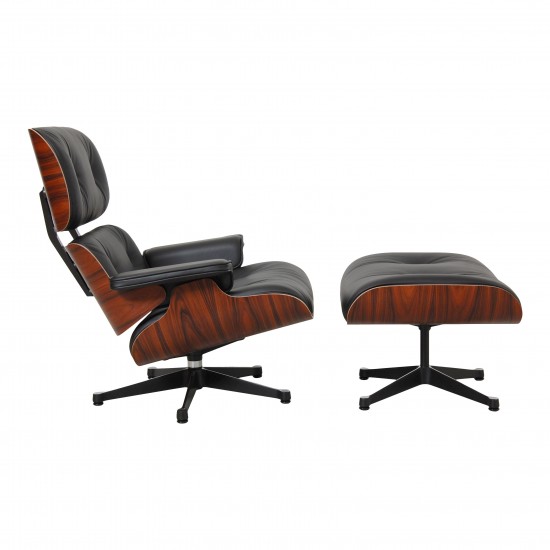 Charles Eames Ny Lounge chair med fodskammel i sort læder og palisander