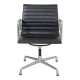 Charles Eames EA-108 chair with black leather and an aluminium frame