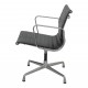 Charles Eames EA-108 chair with black leather and an aluminium frame