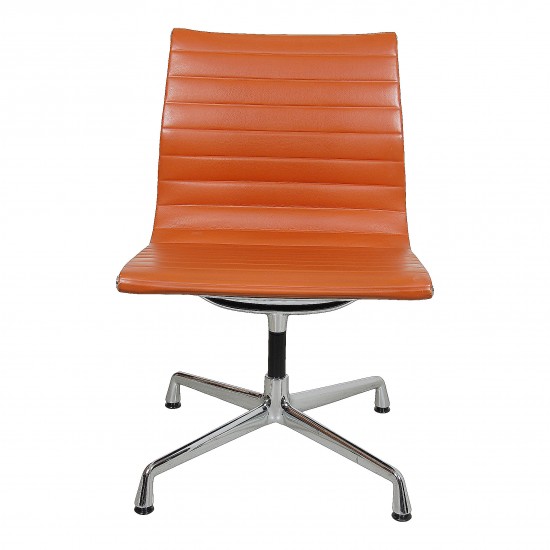 Charles Eames EA-105 chair with cognac leather