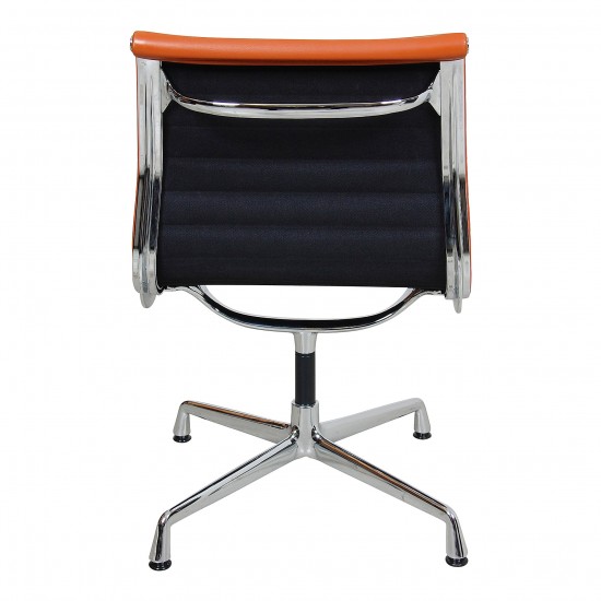 Charles Eames EA-105 chair with cognac leather