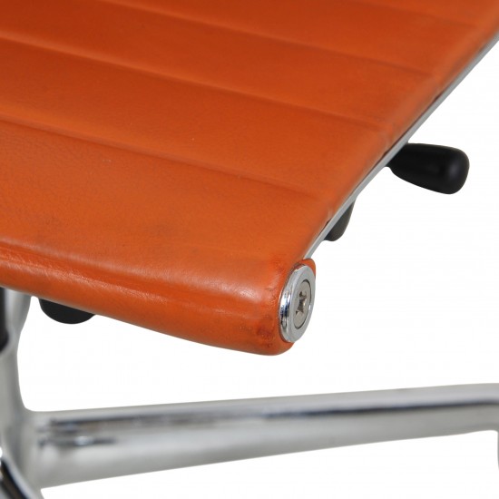 Charles Eames EA-115 office chair in cognac leather