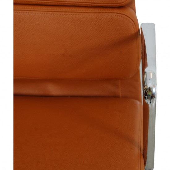 Charles Eames Ea-208 chair reupholstered in cognac bizon leather