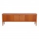 HW Klein (1919-1999) Low teak wood sideboard with sliding doors and drawers