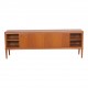 HW Klein (1919-1999) Low teak wood sideboard with sliding doors and drawers