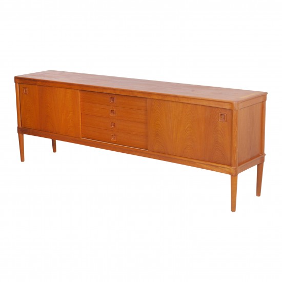 HW Klein (1919-1999) Low teak wood sideboard with sliding doors and drawers