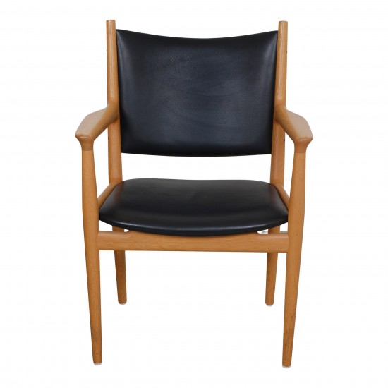 Hans J Wegner Armchair model JH 713 with black leather and oak frame