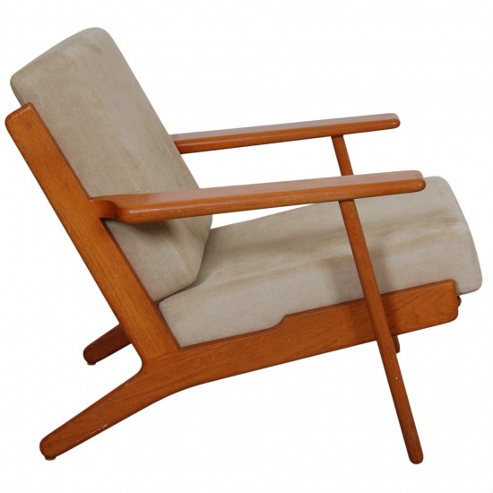 Hans Wegner GE-290 Lounge chair of lacquered nut wood, and beige fabric