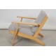 Hans Wegner GE-290 Lounge chair of lacquered oak, and grey fabric