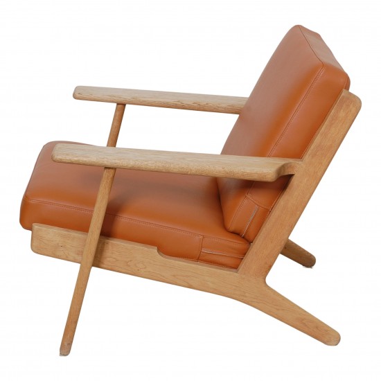 Hans J Wegner GE-290 chair with newly upholstered cognac bison cushions