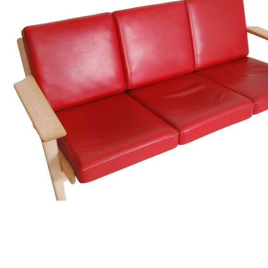 Hans J Wegner 3-personers sofa with red leather and an oak wood frame