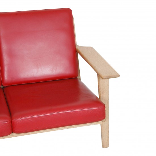 Hans J Wegner 3-personers sofa with red leather and an oak wood frame