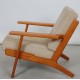 Hans Wegner GE-290 Lounge chair of lacquered nut wood, and beige fabric