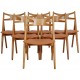 Set of 6 Hans Wegner Sawbuck dining chairs in oak and cognac anilin leather