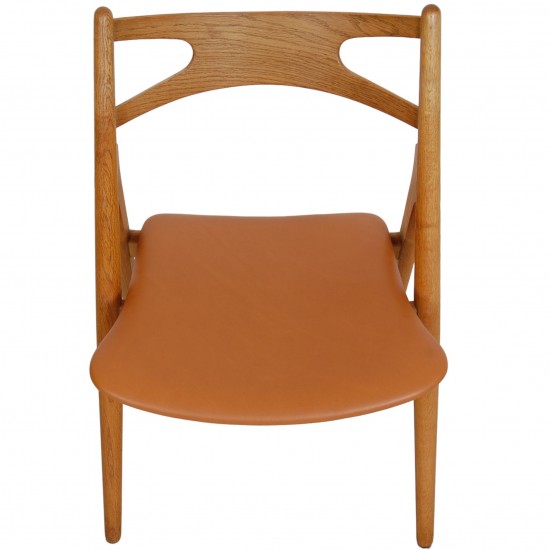 Set of 6 Hans Wegner Sawbuck dining chairs in oak and cognac anilin leather