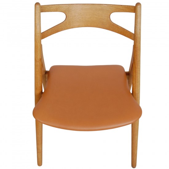 Set of 6 Hans Wegner Sawbuck dining chairs in oak and cognac anilin leather