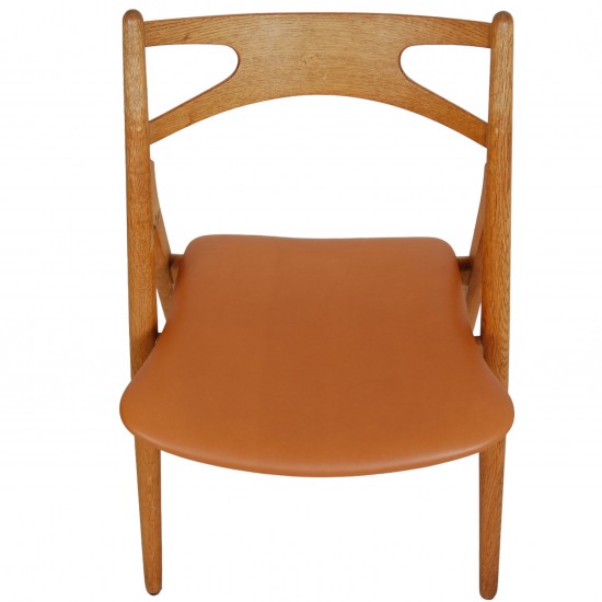 Set of 6 Hans Wegner Sawbuck dining chairs in oak and cognac anilin leather